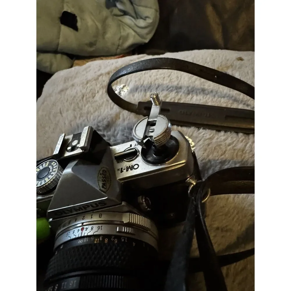 Olympus OM-1n Camera in Chrome With 50mm 1:1.8 Auto S Lens